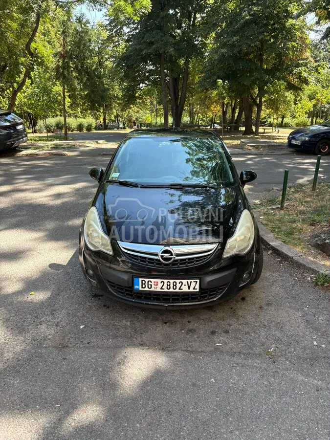 Opel Corsa D 2012 photo 2