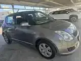 Suzuki Swift 2009 photo 2