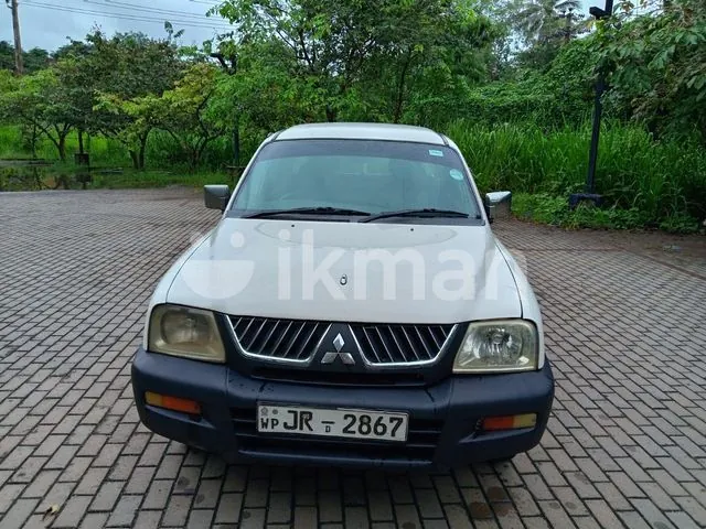 Mitsubishi L200 2004 photo 2