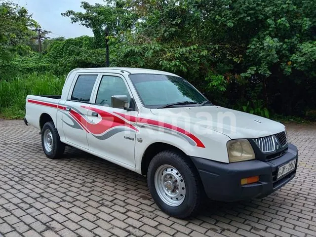 Mitsubishi L200 2004 photo 3
