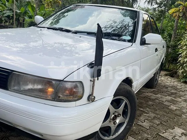Nissan Sunny 1990 photo 2