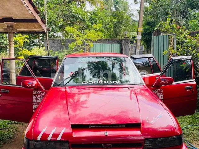 Mazda 3 1999 photo 4