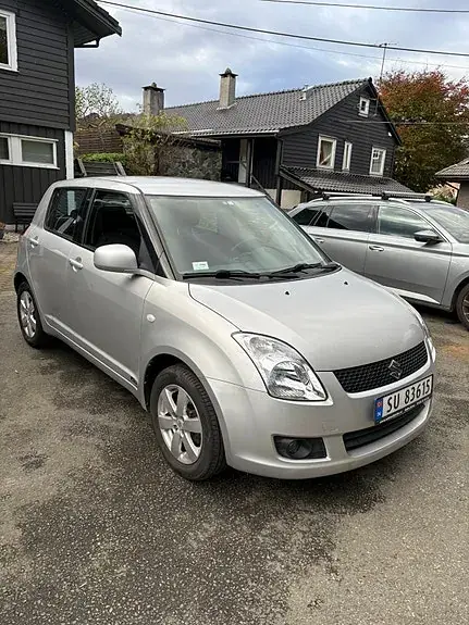 Suzuki Swift 2010 photo 2