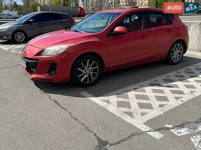 Mazda 3 2011 photo 2