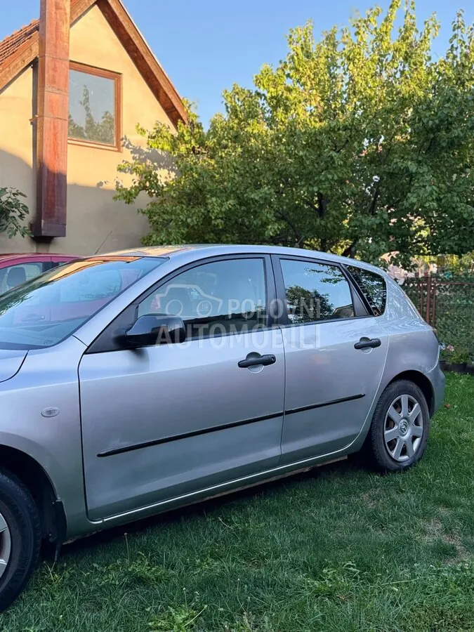 Mazda 3 2006 photo 2