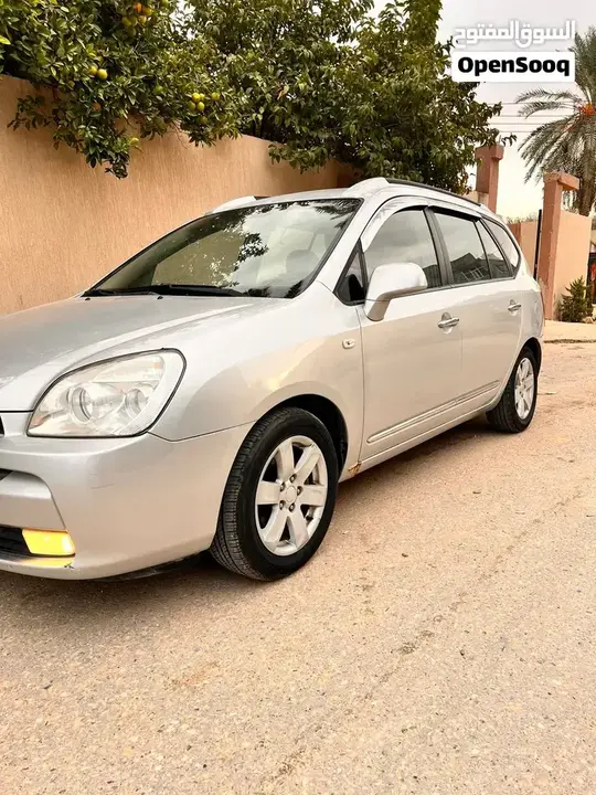 Kia Carens 2009 photo 2