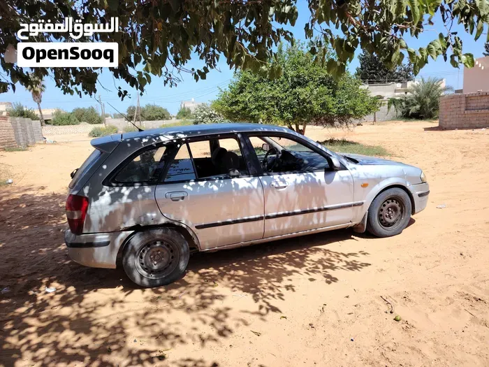 Mazda 323 2002 photo 2