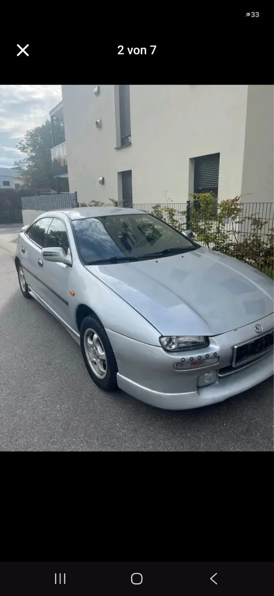 Mazda 323 1997 photo 2
