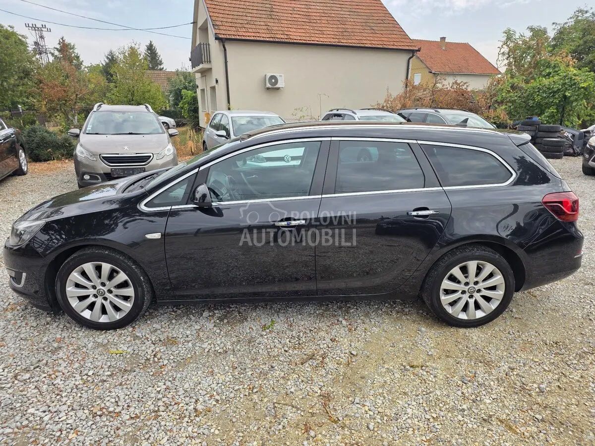 Opel Astra J 2013 photo 4