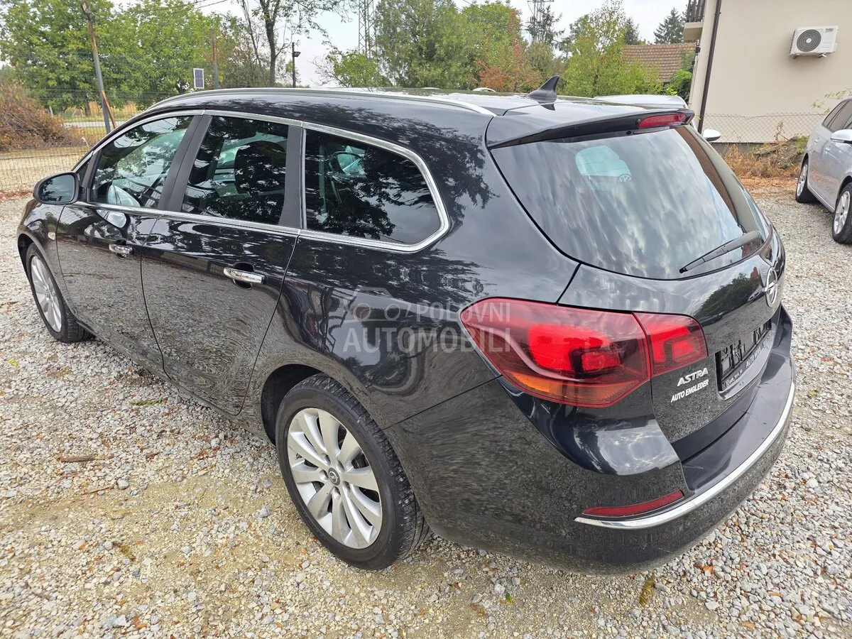 Opel Astra J 2013 photo 5