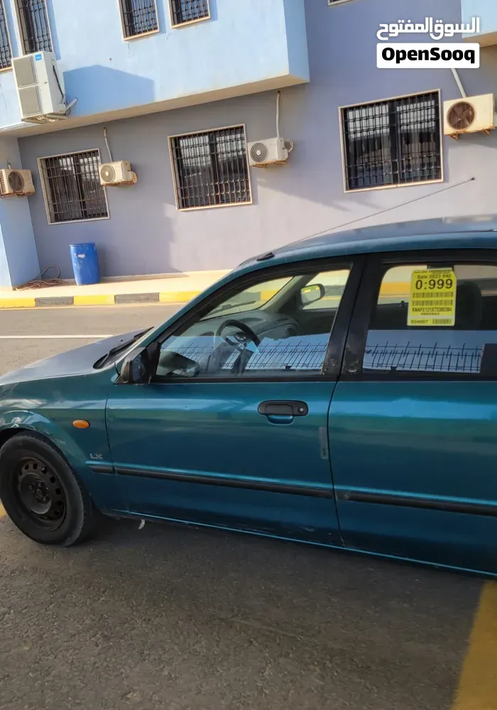 Mazda 323 1999 photo 2
