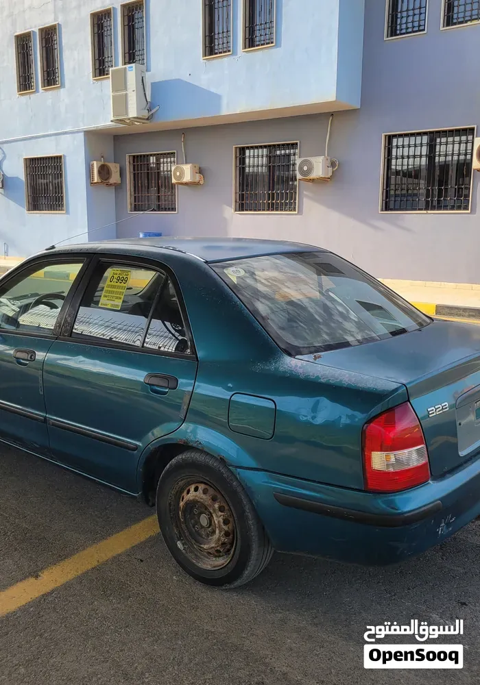 Mazda 323 1999 photo 3