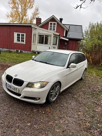BMW 320D 2009 photo 2