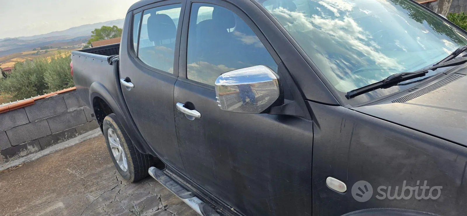Mitsubishi L200 2013 photo 2
