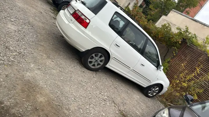 Kia Carens 2005 photo 2