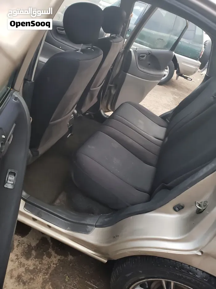 Suzuki Liana 2004 photo 4