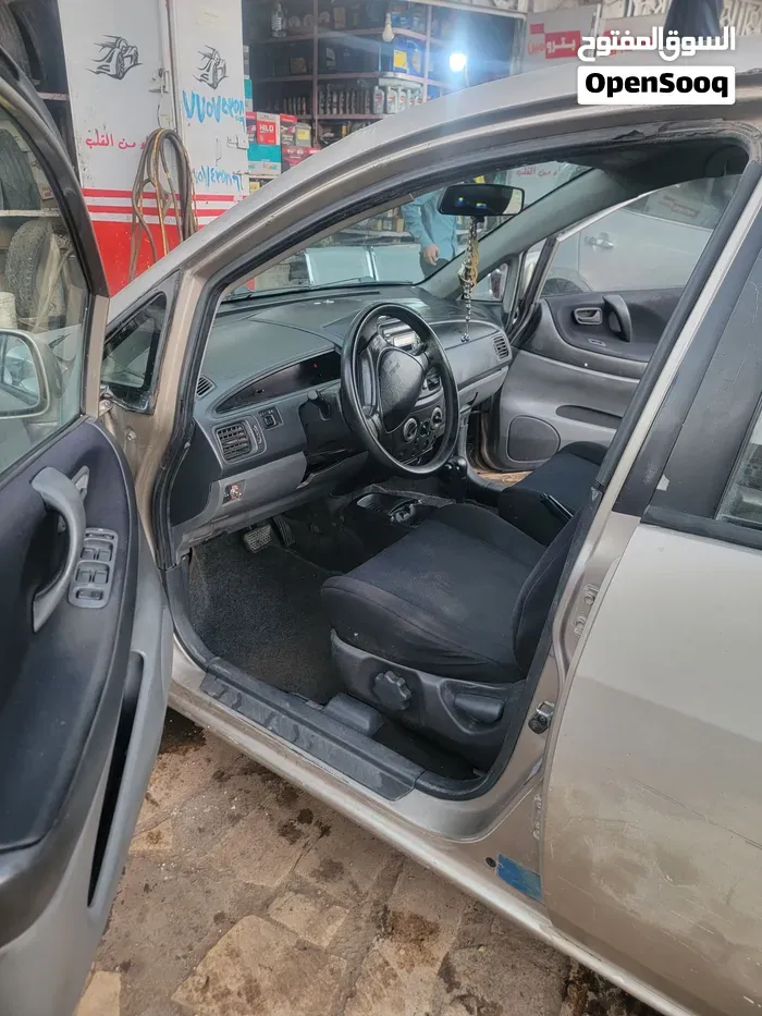 Suzuki Liana 2004 photo 2