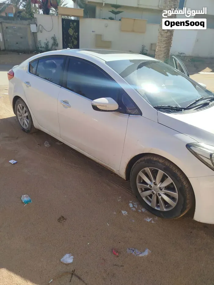 Kia K3 2012 photo 2