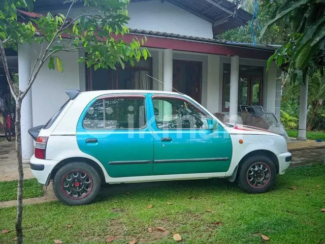 Nissan March 1995 photo 2