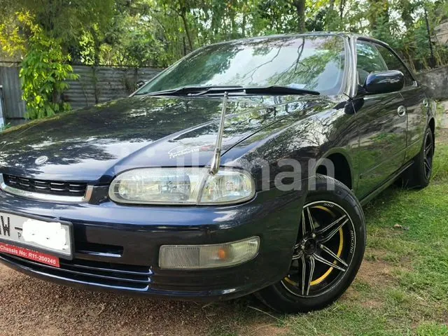 Nissan Presea 1999 photo 2