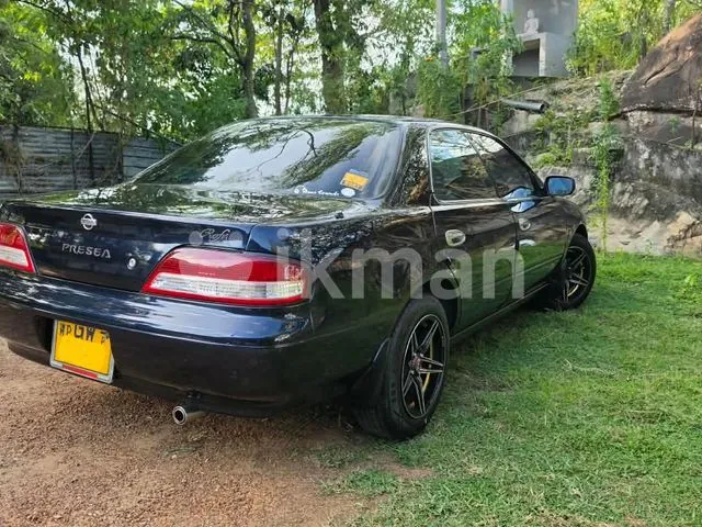 Nissan Presea 1999 photo 4