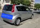Nissan Note 2010 photo 4