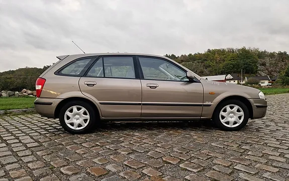 Mazda 323 2000 photo 4