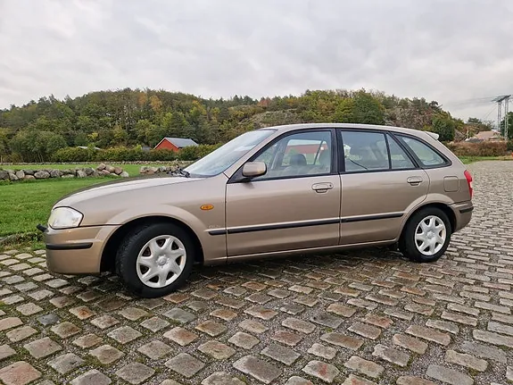 Mazda 323 2000 photo 2