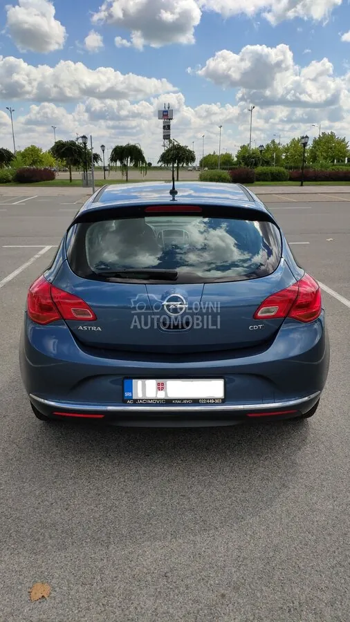 Opel Astra J 2013 photo 4
