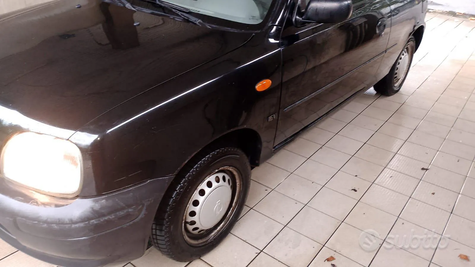 Nissan Micra 1998 photo 4