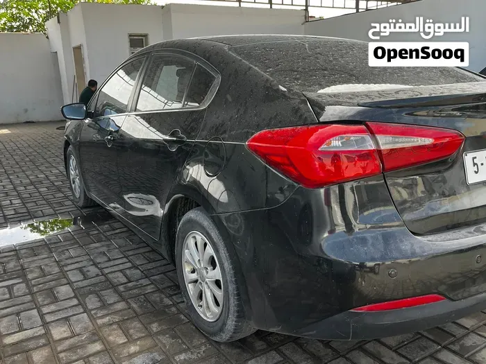 Kia K3 2014 photo 2