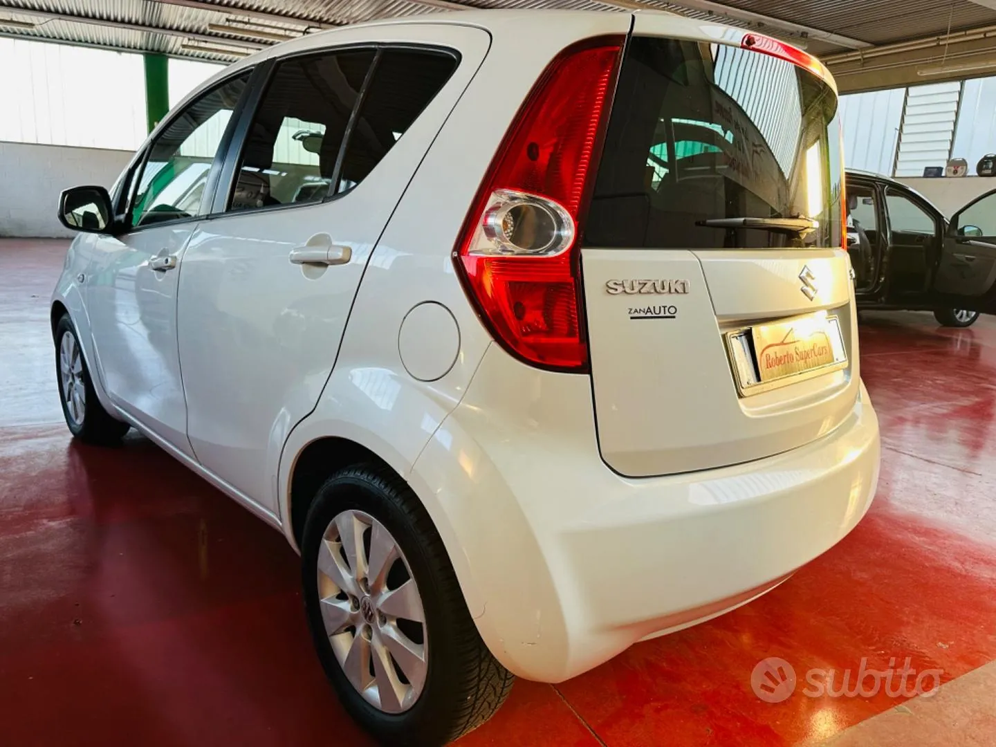 Suzuki Splash 2010 photo 4