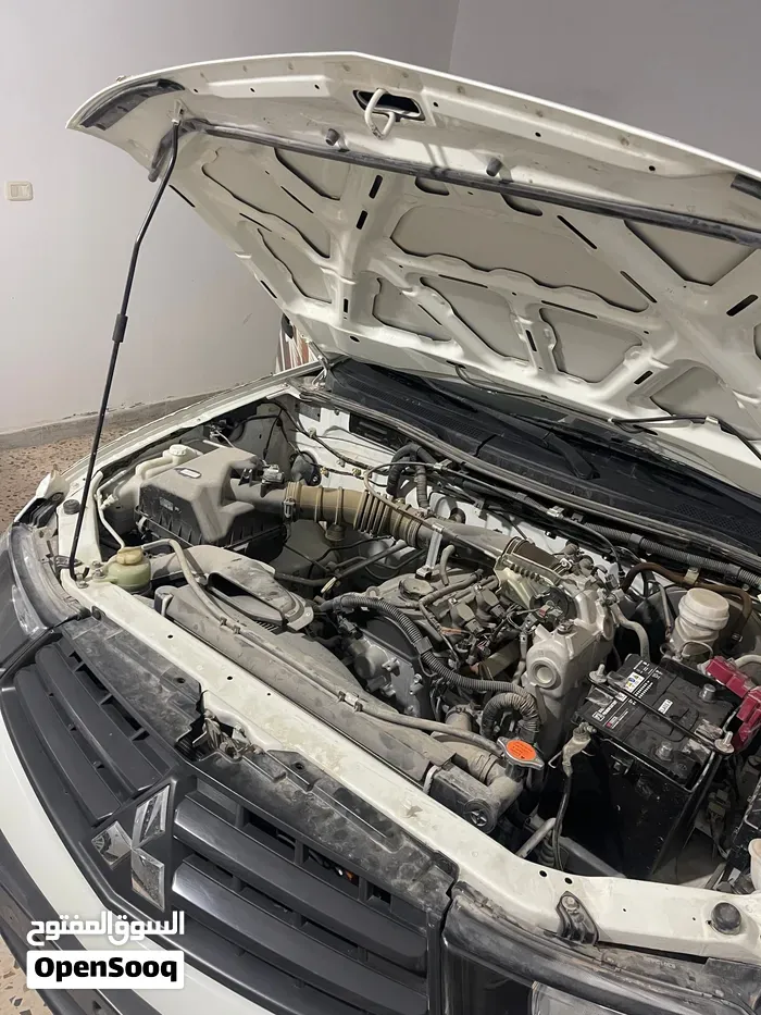 Mitsubishi L200 2013 photo 4