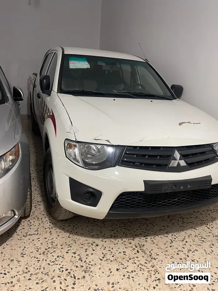 Mitsubishi L200 2013 photo 3