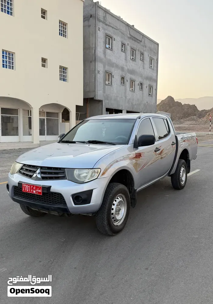 Mitsubishi L200 2013 photo 3