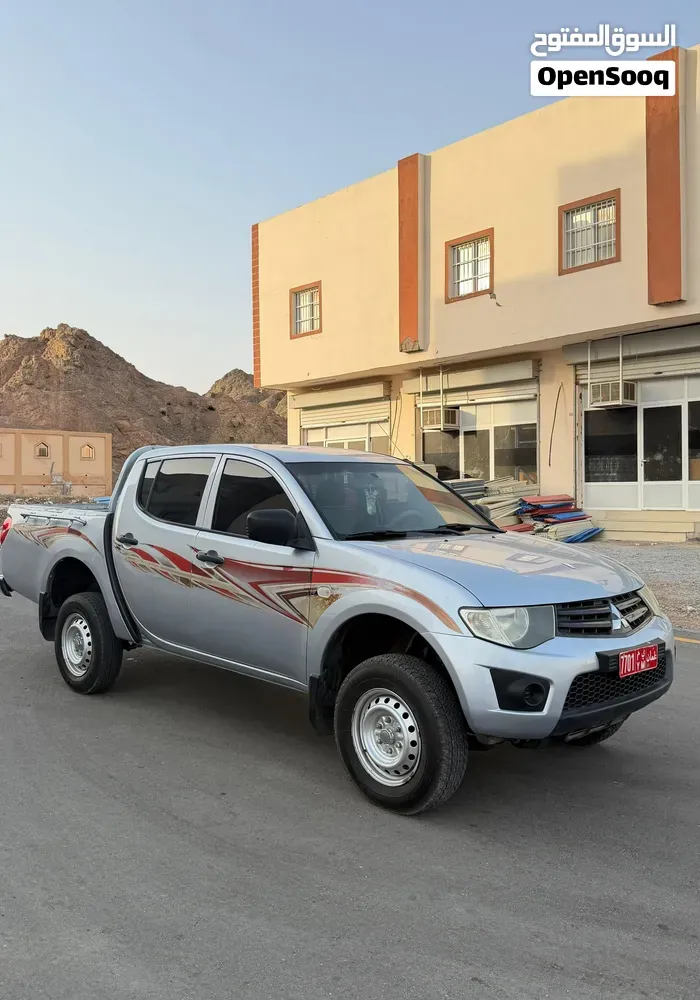 Mitsubishi L200 2013 photo 4