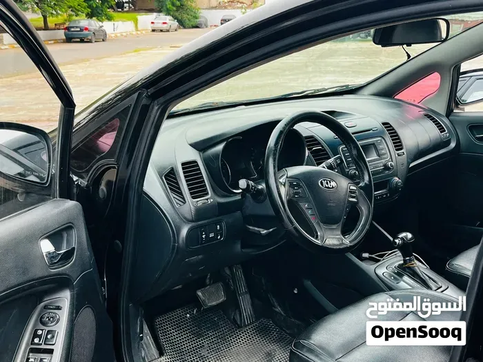 Kia K3 2014 photo 2