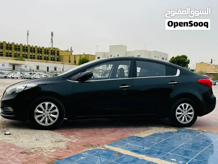 Kia K3 2014 photo 4