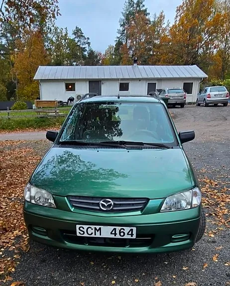 Mazda Demio 2000 photo 3