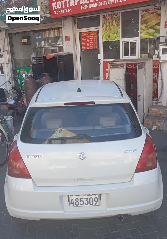 Suzuki Swift 2006 photo 2