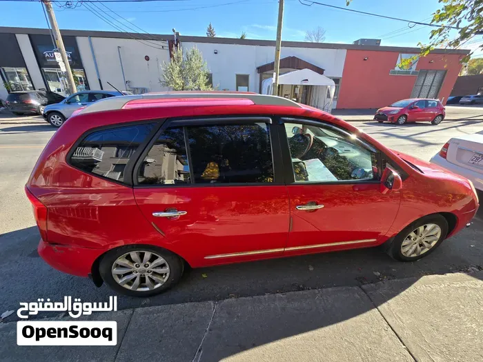 Kia Rondo 2012 photo 2