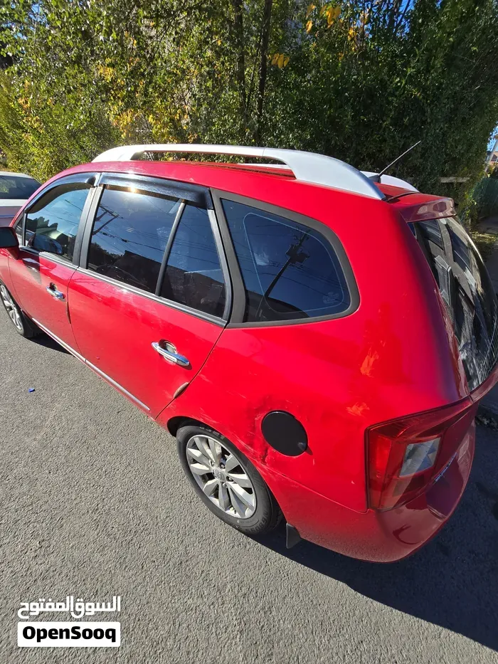 Kia Rondo 2012 photo 3
