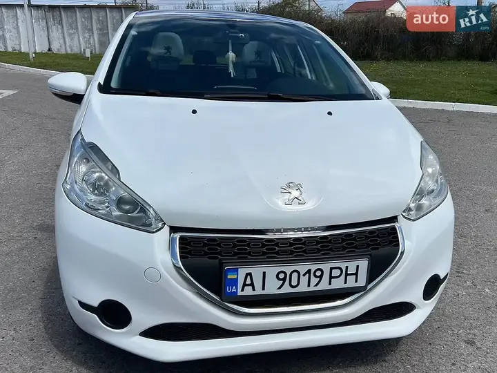 Peugeot 208 2013 photo 4