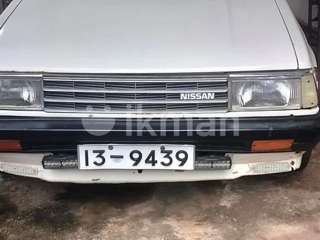 Nissan B11 1985 photo 4
