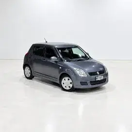 Suzuki Swift 2010 photo 2