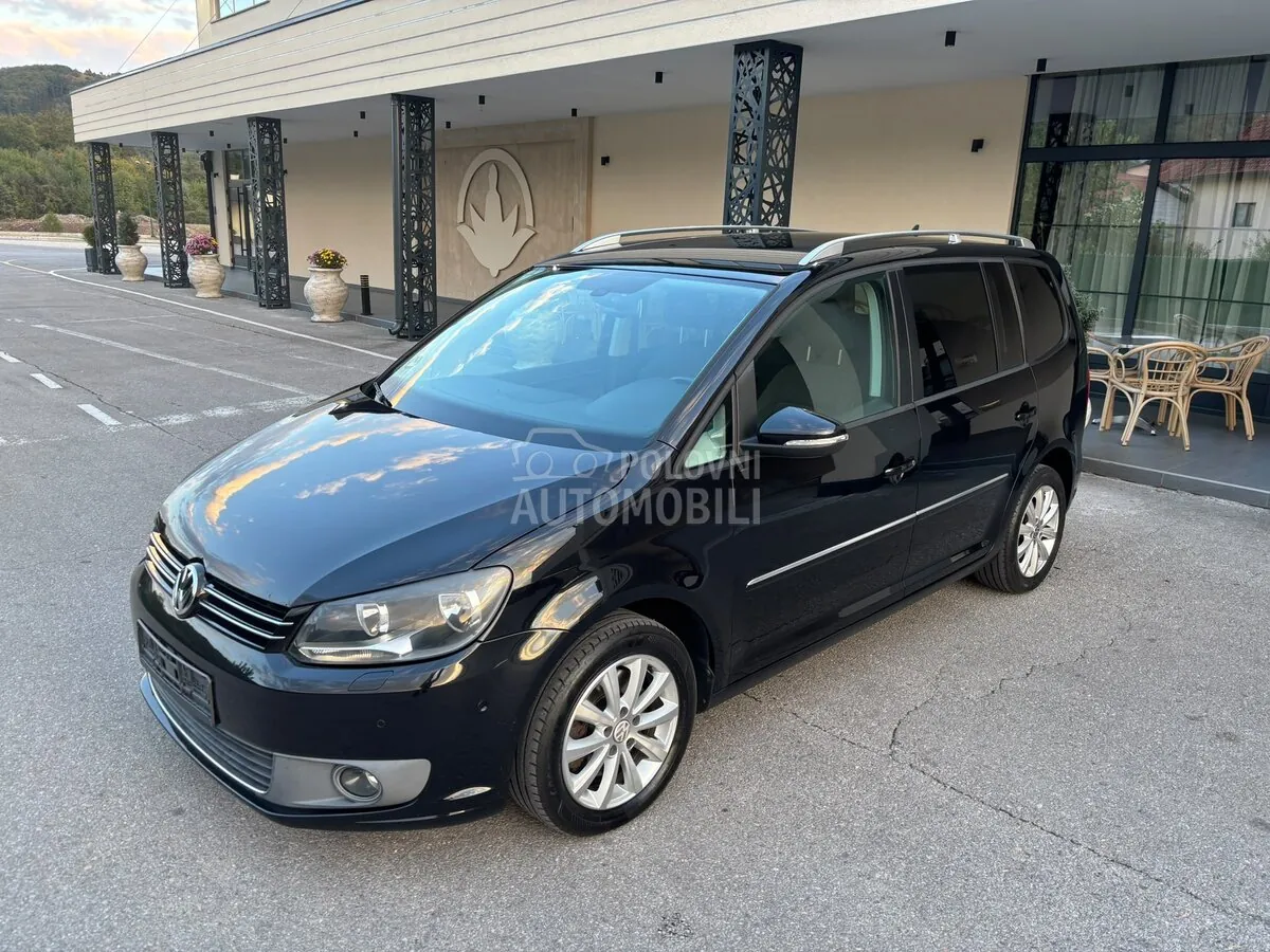 Volkswagen Touran 2011 photo 2