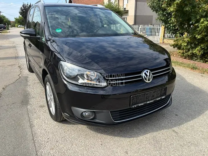 Volkswagen Touran 2012 photo 4