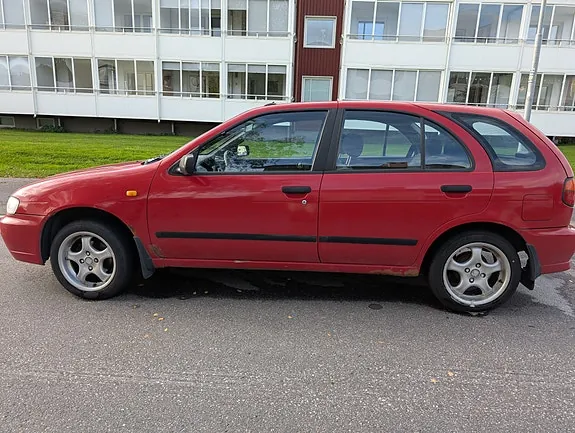 Nissan Almera 1997 photo 5