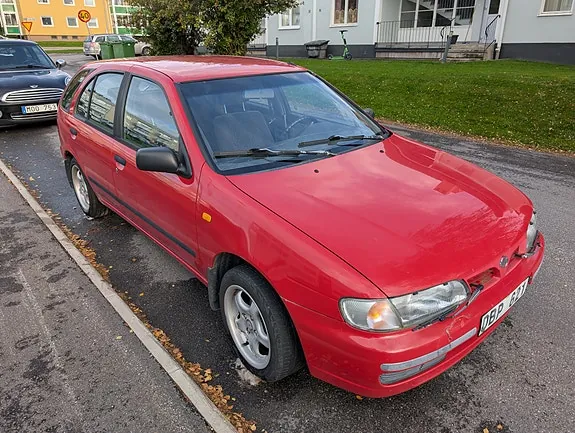 Nissan Almera 1997 photo 2