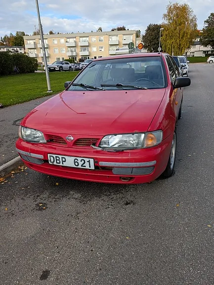 Nissan Almera 1997 photo 3